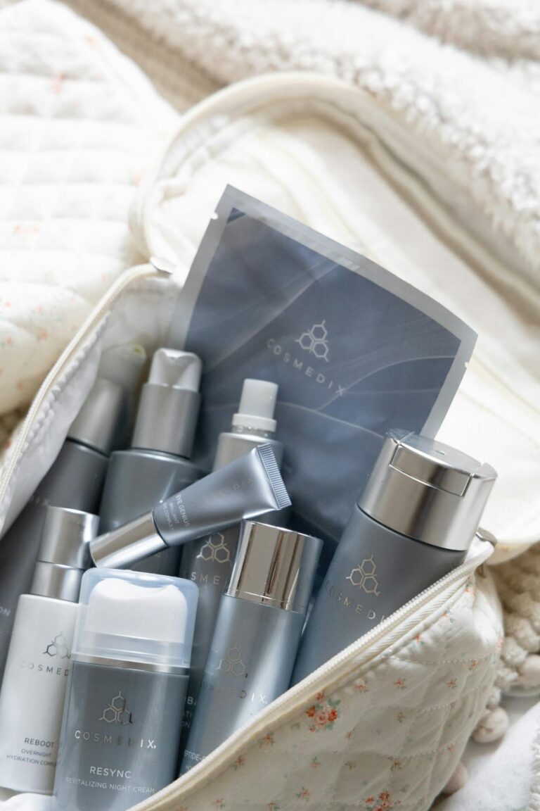 A selection of skincare products neatly arranged in a quilted travel bag for easy access.